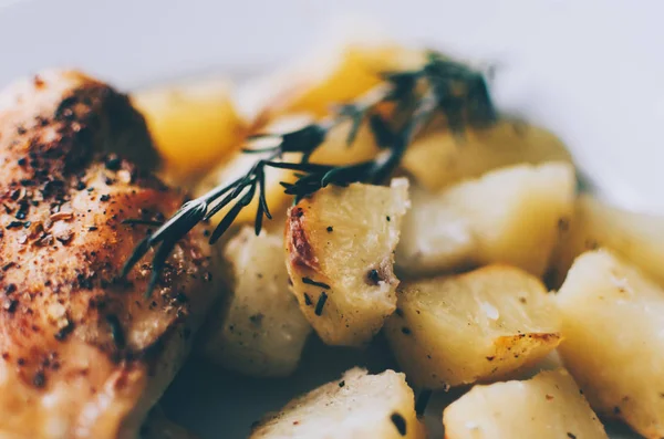 Baked potato and chicken — Stock Photo, Image