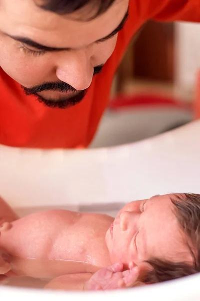 Father Holding Newborn Daughter Bathing White Bathtub Little Infant Girl — Stock Photo, Image