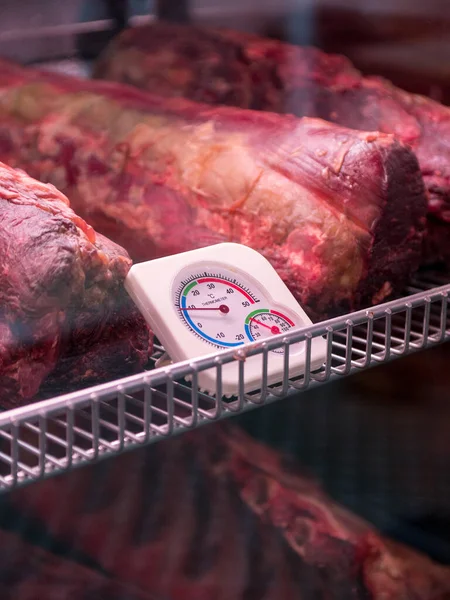 Prepare dried meats. Beef jerky. Jerky. Meat shop. Marbled beef dry aging lies in the refrigerator Whisky Dry-Aged Steaks. Beef & Glory, Display of Dry Aged Meat Steaks in butchers shop or restaurant