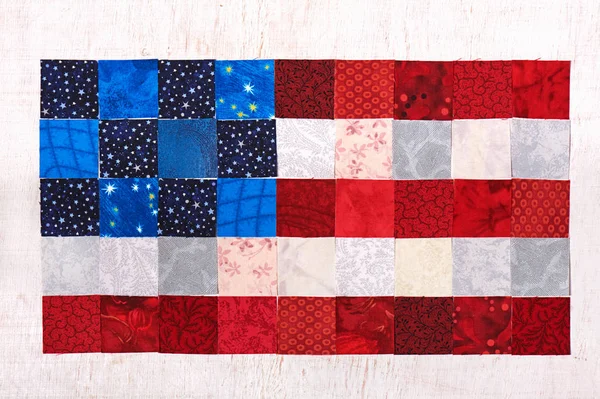 Négyzet alakú darab szövet hazudik, mint a zászló, Amerikai Egyesült Államok — Stock Fotó