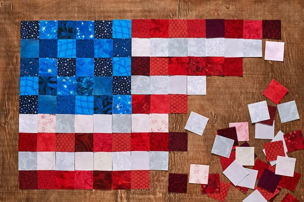 Square pieces of fabrics lying like a flag of USA — Stock Photo, Image