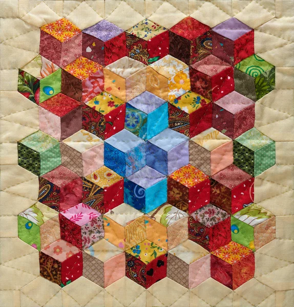 Fragment of quilt sewn from diamonds and has view three-dimensional — Stock Photo, Image