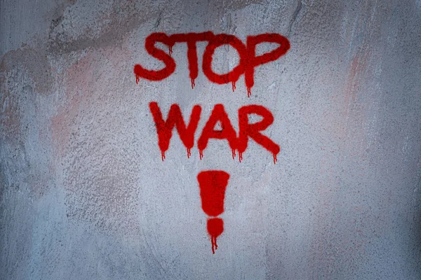 Stop War text spray paint on the wall