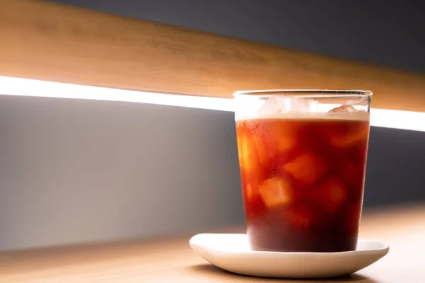 A glass of ice americano in coffee cafe — 스톡 사진