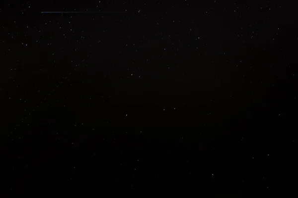 星のある黒い空の背景 — ストック写真