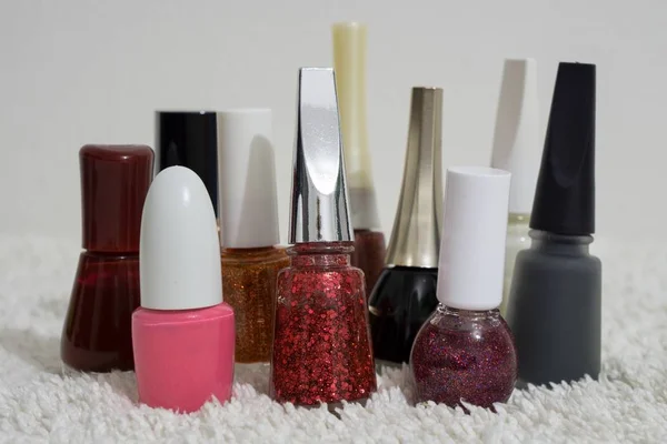 Nail polishes of many colors on a table