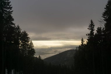 Grey clouds over mountains landscape  