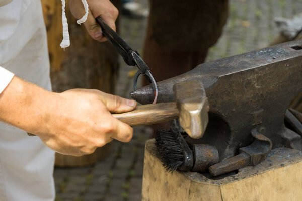 Zilina, Slovakia. 19-Jul-2018: Days of mediaeval art in Zilina. Market: Man roughing the iron. Slovakia