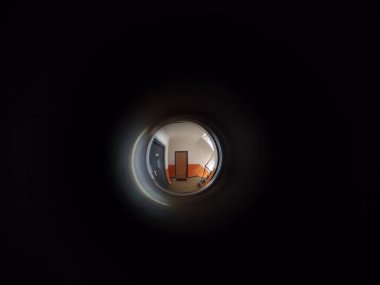 View to the hall through peephole eyelet in the door. Slovakia clipart