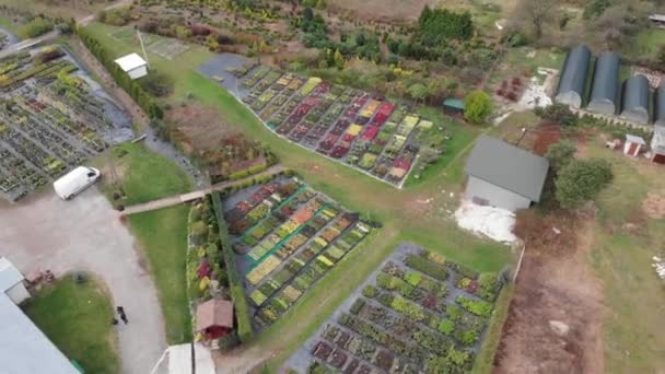 Vista aérea superior del lugar de la tienda de jardín — Vídeos de Stock