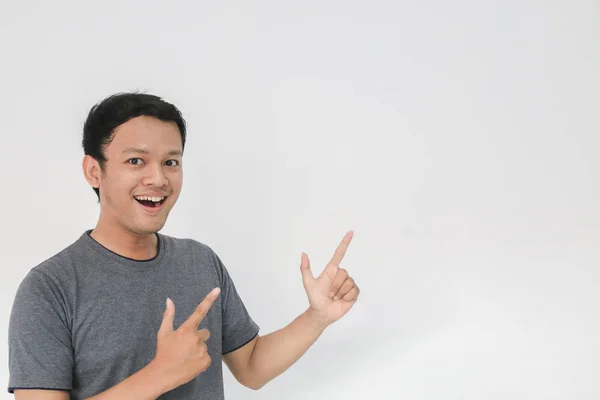 Funny Asian Man Grey Shirt Gesturing Posing Studio — Stock Photo, Image