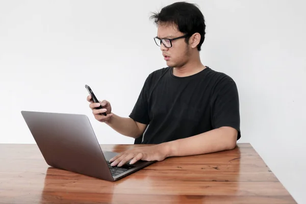 Young Surprised Asian Man Working Studio — Stockfoto