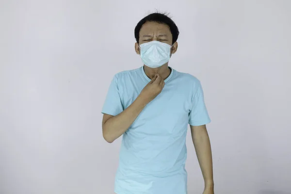 Young Asian Man Wearing Medical Mask Suffering Severe Headache Pressing — Stock Photo, Image