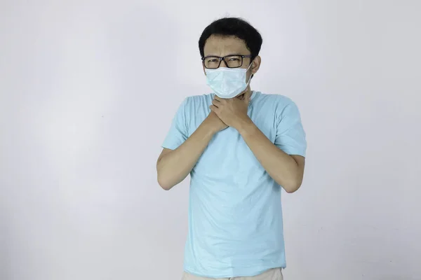 Young Asian Man Having Sore Throat Touching His Neck Wearing — Stock Photo, Image