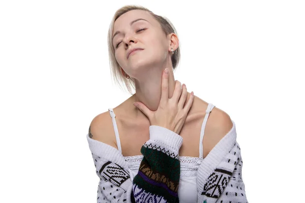 Blond woman touching neck — Stock Photo, Image