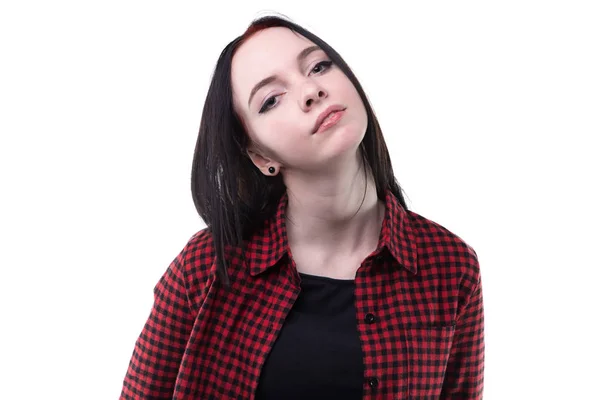 Brunette jonge vrouw in plaid shirt — Stockfoto
