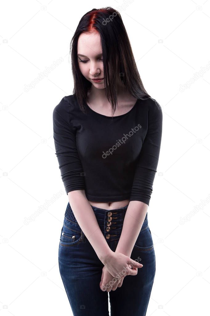 Young shy brunette with arms crossed