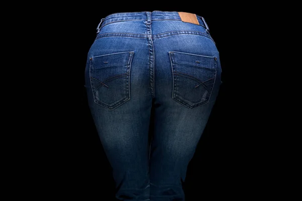 Womans buttocks and blue jeans — Stock Photo, Image