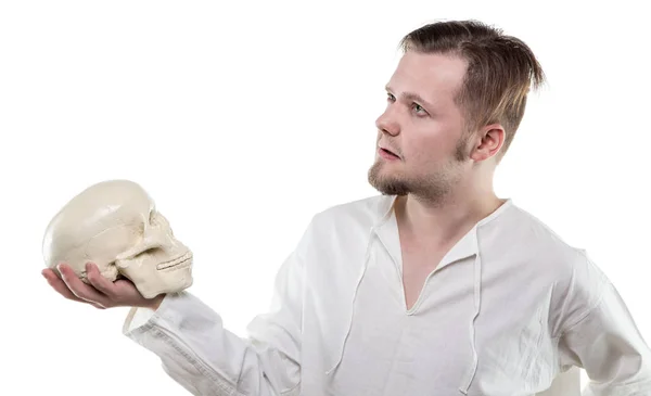 Blond man with human skull — Stock Photo, Image