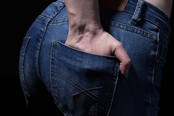 Buttocks and hand in jeans pocket — Stock Photo, Image