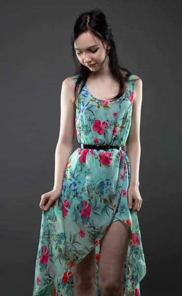 Shy young woman in dress — Stock Photo, Image