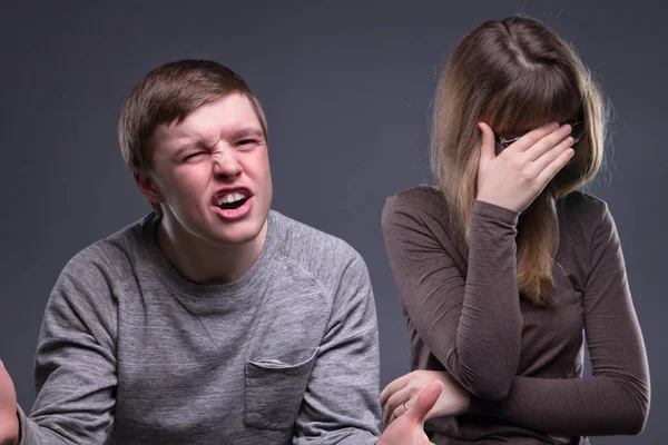 Portrait of shame young woman and man — Stock Photo, Image