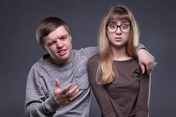 Young man and surprised girl — Stock Photo, Image