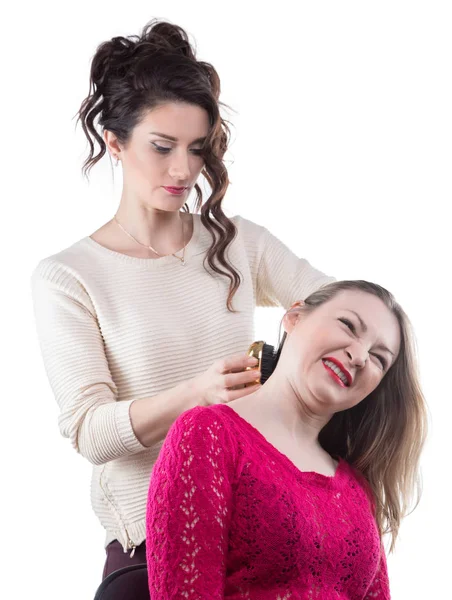 Hairdresser hurts during brushing — Stock Photo, Image