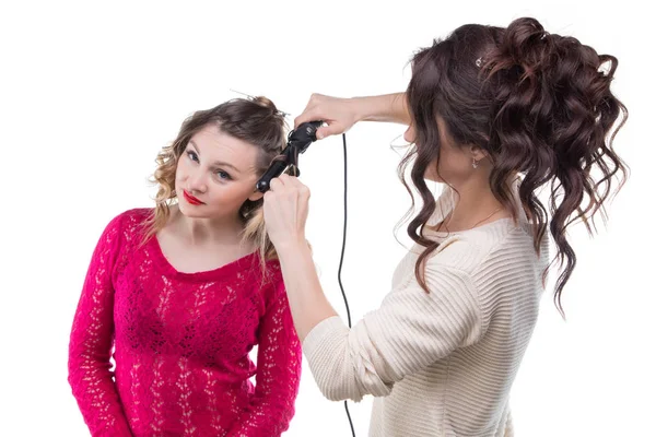 Blond client with curls and hairstylist — Stock Photo, Image