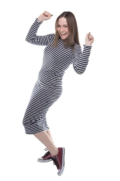 Winner young woman in striped dress, full length — Stock Photo, Image