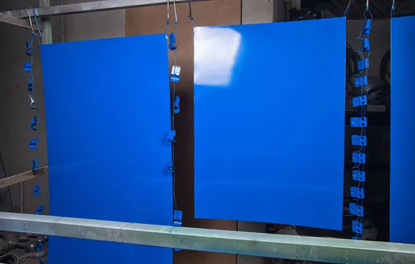 Powder coating and drying of blue details