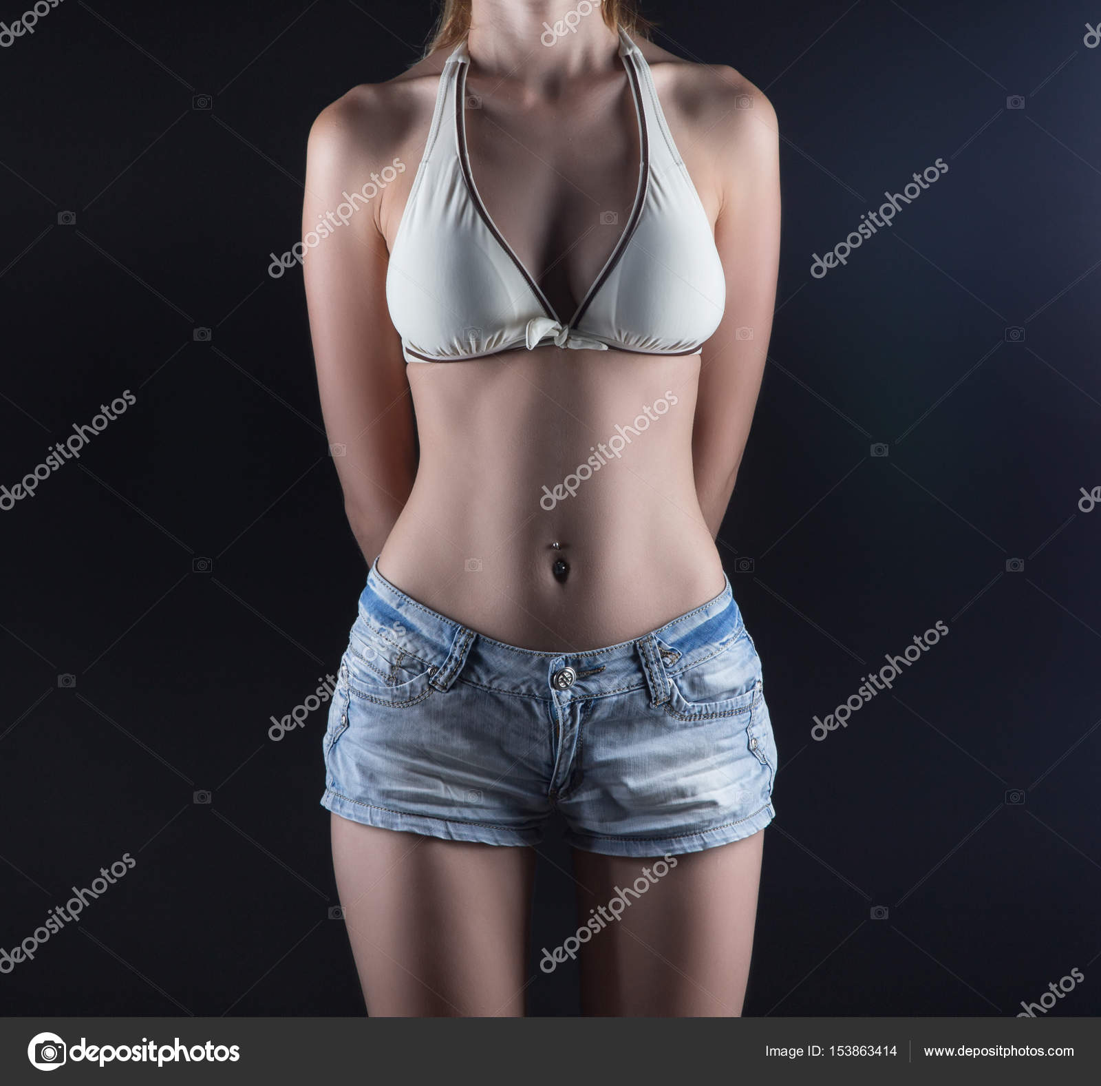 Photo of young woman in jeans shorts Stock Photo by ©ChrisTefme