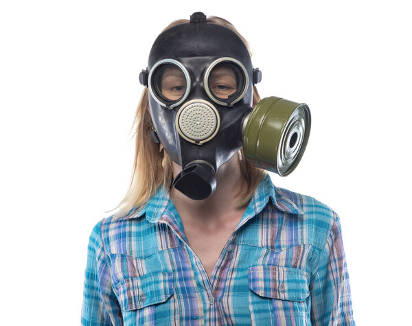 Young woman in gas mask