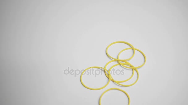 Falling elastic bands for money, slow motion — Stock Video