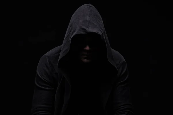 Young man in hood and shadow — Stock Photo, Image