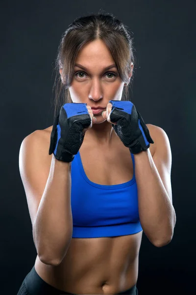Brunette young woman with gloves — Stock Photo, Image