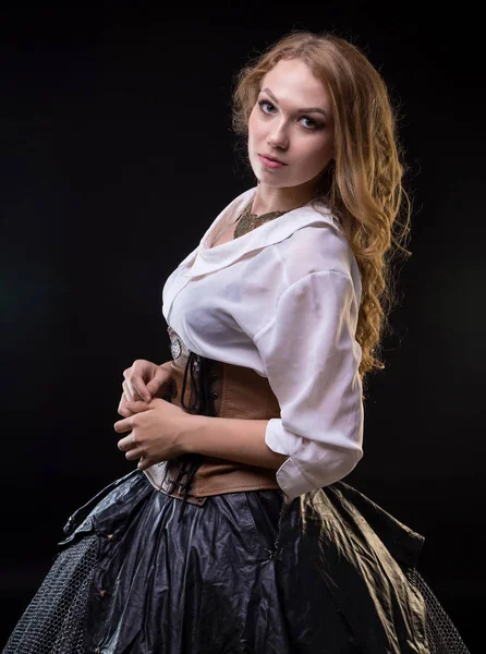 Blond young woman in fantasy dress — Stock Photo, Image