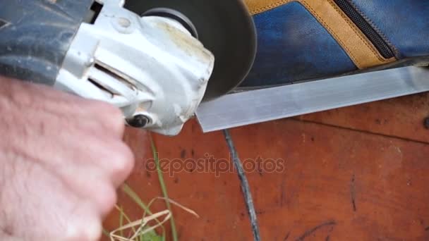 Man with circular saw in working process — Stock Video