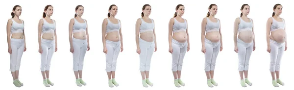 Foto junges Mädchen während der Schwangerschaft mit nacktem Bauch — Stockfoto