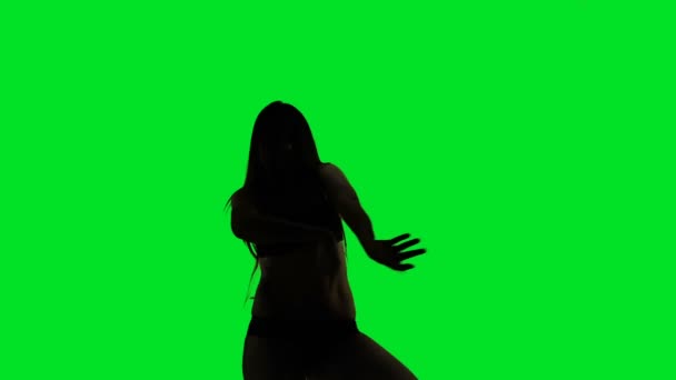 Tanzende Silhouette eines jungen Mädchens — Stockvideo