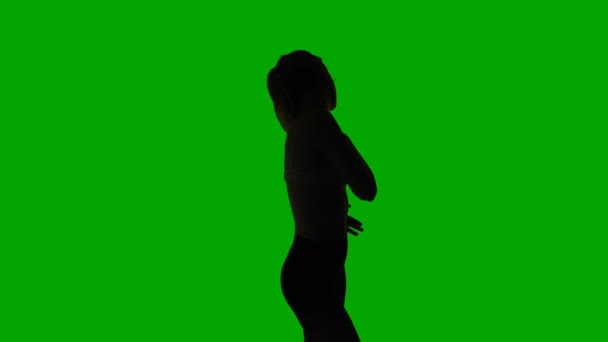 Tanzende erotische junge Mädchen, Silhouette — Stockvideo