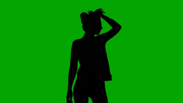 Silhouette of dancing slim girl — Stock Video