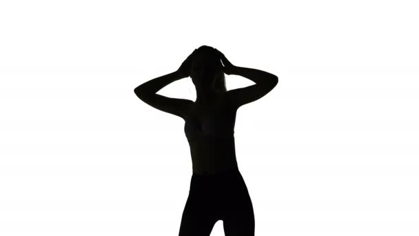 Dancing plastic young woman, silhouette — Stock Video