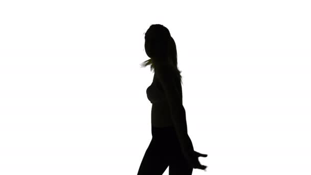 Dancing erotic girl, isolated silhouette — Stock Video