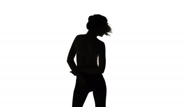 Dancing plastic young girl, isolated silhouette — Stock Video