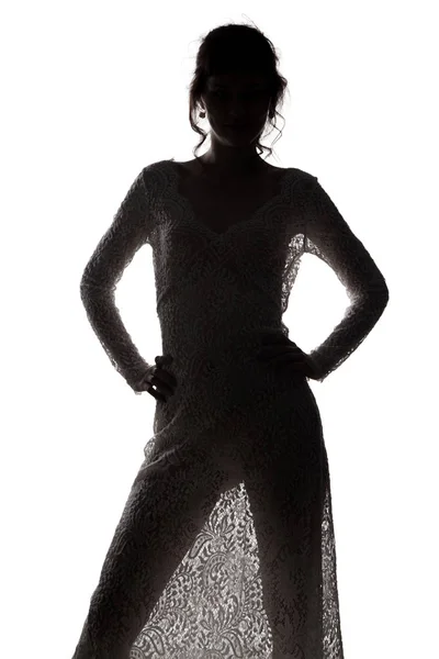 Woman in see-through dress with hands on hips — Stock Photo, Image