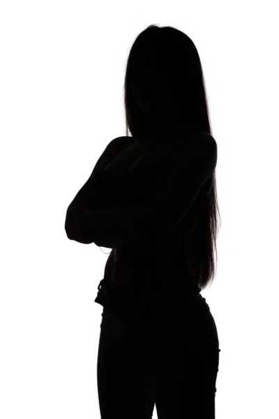 Silhouet van staande meisje — Stockfoto