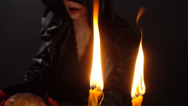 Woman during ritual and candles — Stock Video