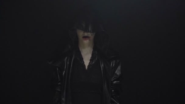 Woman in black hood — Stock Video