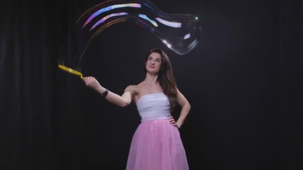 Brunette girl with soap bubbles — Stock Video